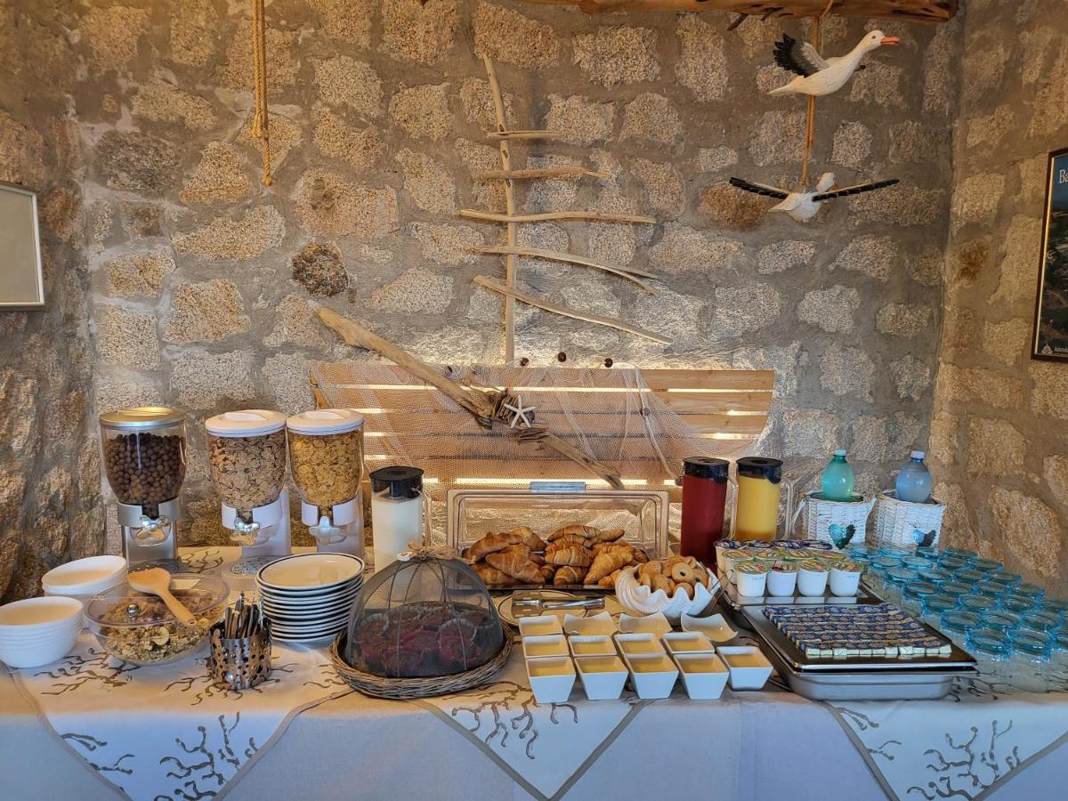 באיה סרדיניה Hotel Olimpia מראה חיצוני תמונה