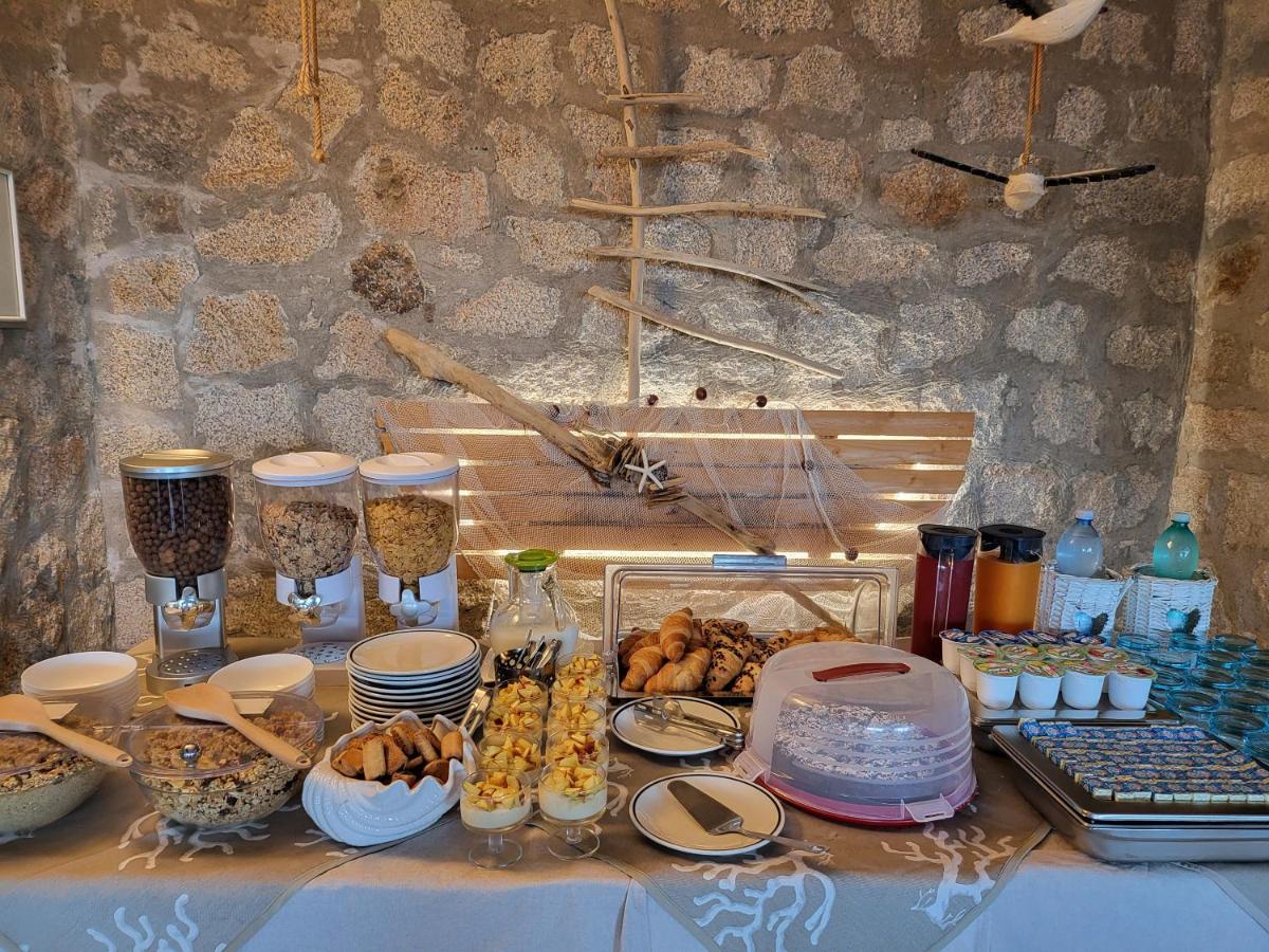 באיה סרדיניה Hotel Olimpia מראה חיצוני תמונה