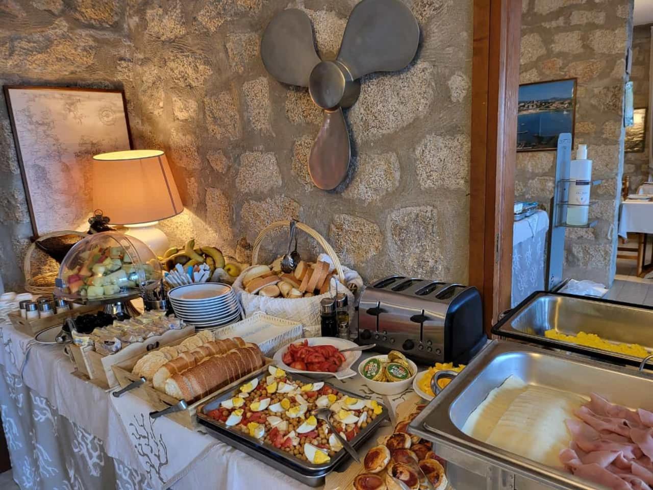 באיה סרדיניה Hotel Olimpia מראה חיצוני תמונה